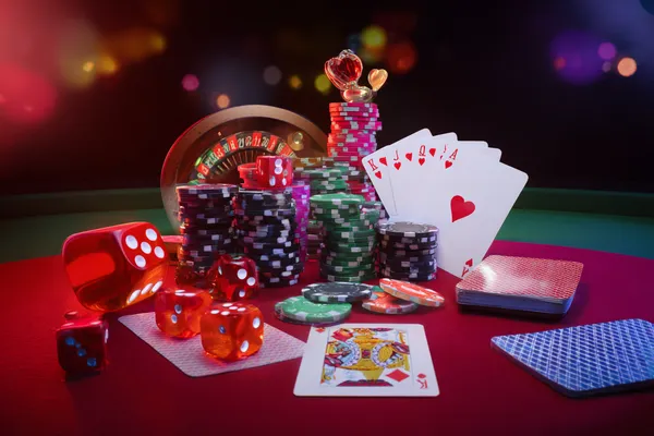 A player using their smartphone during a festive local event, representing 5XGAME’s fully mobile-friendly casino.